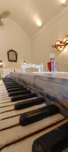 a close up of a keyboard in a room at Aliori art caves in Aegiali