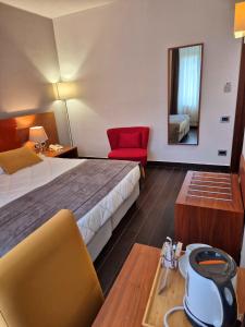 Postel nebo postele na pokoji v ubytování Hotel Sandalia + 37 fotografií