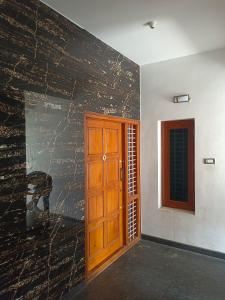 Photo de la galerie de l'établissement Royal Home Stay Mysuru - Service Apartment, à Mysore