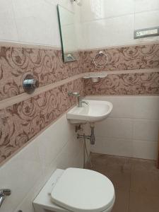 Photo de la galerie de l'établissement Royal Home Stay Mysuru - Service Apartment, à Mysore