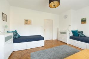 En eller flere senge i et værelse på Orgona Vendégház