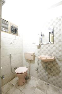 Koupelna v ubytování Hotel Satyam Swagat