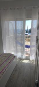 Cama o camas de una habitación en Apartamento en Salou-Vistas al Mar