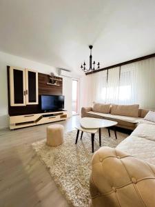 TV a/nebo společenská místnost v ubytování City Apartments 3bedroom