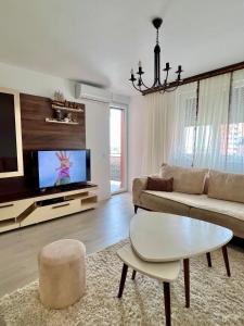 TV a/nebo společenská místnost v ubytování City Apartments 3bedroom