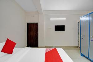 Postel nebo postele na pokoji v ubytování Hotel O Grand Eden