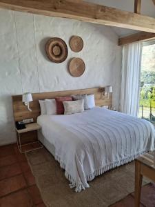 a bedroom with a large bed and a window at Umoya Residence in Cape Town +41 photos