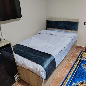 Postel nebo postele na pokoji v ubytování Red Pyramids Hotel