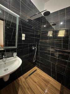 Koupelna v ubytování Hotel Hyso Vela