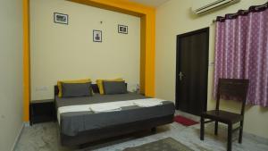Letto o letti in una camera di hotel kishangarh jaisalmer