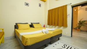 Letto o letti in una camera di hotel kishangarh jaisalmer