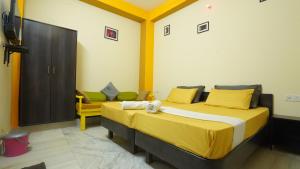 Letto o letti in una camera di hotel kishangarh jaisalmer