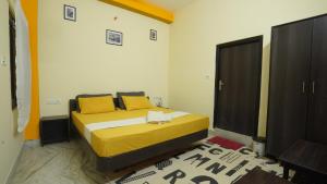 Letto o letti in una camera di hotel kishangarh jaisalmer