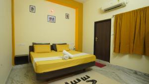 Letto o letti in una camera di hotel kishangarh jaisalmer