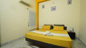 Letto o letti in una camera di hotel kishangarh jaisalmer