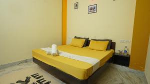 Letto o letti in una camera di hotel kishangarh jaisalmer