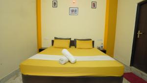 Letto o letti in una camera di hotel kishangarh jaisalmer