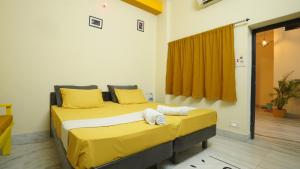 Letto o letti in una camera di hotel kishangarh jaisalmer