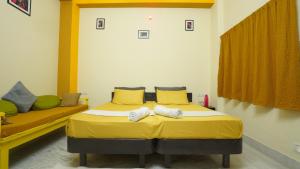 Letto o letti in una camera di hotel kishangarh jaisalmer