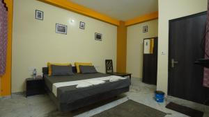 Letto o letti in una camera di hotel kishangarh jaisalmer