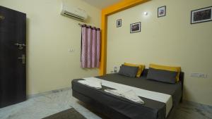 Letto o letti in una camera di hotel kishangarh jaisalmer