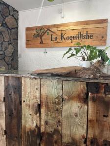 Majutusasutuses La Koquillishe olev sertifikaat, autasu, silt või muu dokument