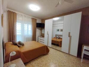 Ένα ή περισσότερα κρεβάτια σε δωμάτιο στο Il Melograno - Just like at home!