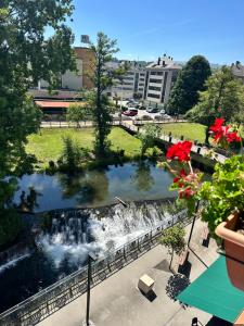 a view of a pond in a park at El Malecon in Sarria
