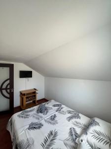Postel nebo postele na pokoji v ubytování Vila Aron