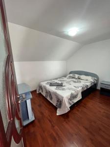 Postel nebo postele na pokoji v ubytování Vila Aron