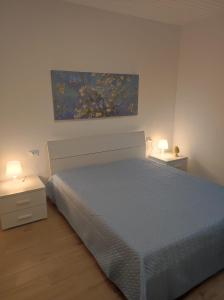 En eller flere senge i et værelse på I Carusi