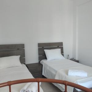 Postel nebo postele na pokoji v ubytování Kellis House