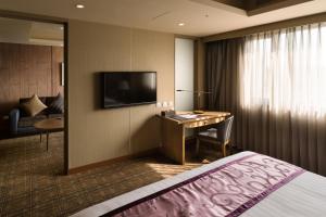 TV a/nebo společenská místnost v ubytování Fushin Hotel Taipei