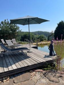 Hosté ubytování Ferienhaus Kellerstöckl Dorrer Riegersburg mit Schwimmteich