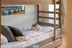 Giường trong phòng chung tại Kiteloft - within walking distance from the sea