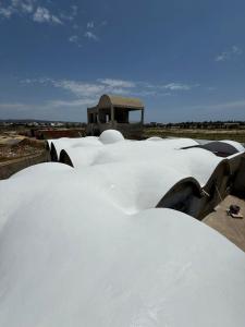 a pile of snow on the roof of a building at Maison Sérénité Campagne in Hammamet Sud
