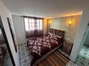 Postel nebo postele na pokoji v ubytování Superbe Duplex -Vue Panoramique et Charme Unique