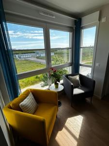 Χώρος καθιστικού στο Appartement Cosy Proche Disneyland - tout Confort