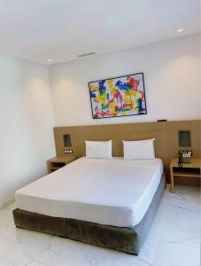 Posteľ alebo postele v izbe v ubytovaní Twin Hotel Tanger