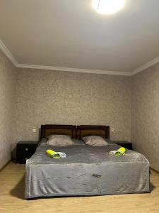 Postel nebo postele na pokoji v ubytování Butichi Guest House