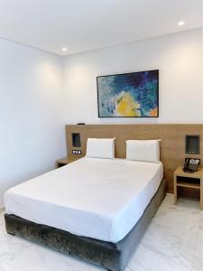 Posteľ alebo postele v izbe v ubytovaní Twin Hotel Tanger