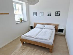 Ένα ή περισσότερα κρεβάτια σε δωμάτιο στο Suite 1 - Apartments am Schloss +8 φωτογραφίες