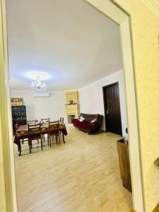 Posezení v ubytování Butichi Guest House