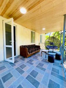 Posezení v ubytování Butichi Guest House