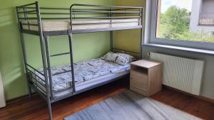 Postel nebo postele na pokoji v ubytování Pokoje Ekonomiczne