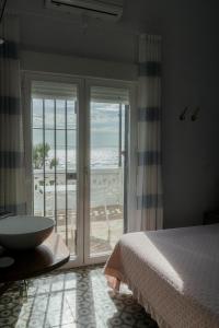 Postel nebo postele na pokoji v ubytování Montserrat Casa del Mar