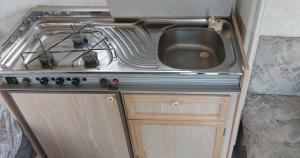 Kuchyň nebo kuchyňský kout v ubytování Caravan Romsicht Sneek