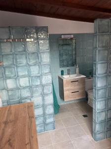 a bathroom with a sink and a toilet at Private house near Amarynthos, Evia, Greece in Amarinthos