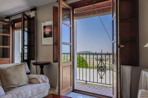 En balkon eller terrasse på Casa Corredera - Hello Vejer