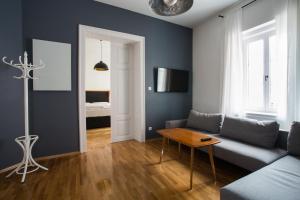 Posezení v ubytování KIRCHENWIRT an der Weinstrasse - Boutique Hotel